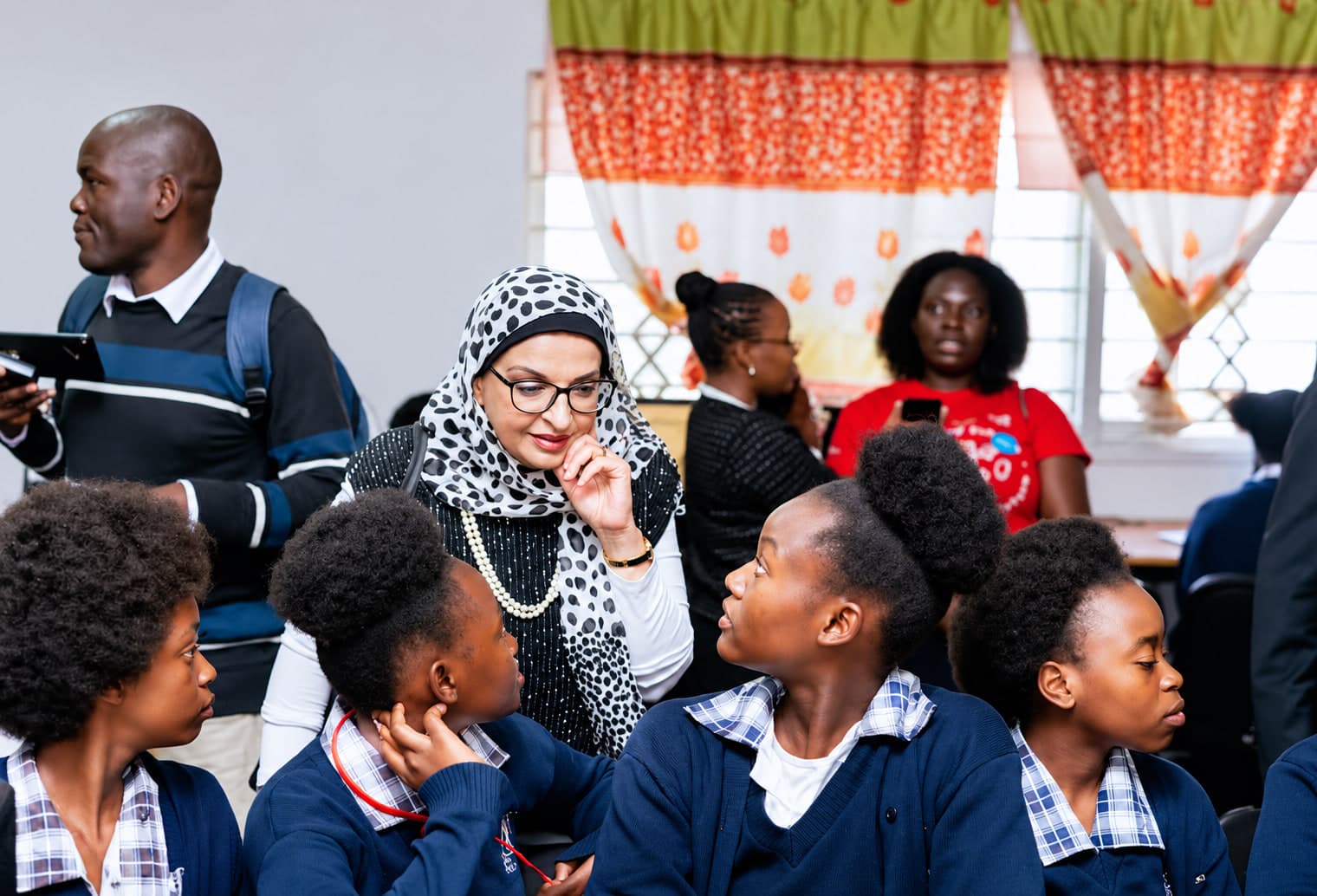 Teacher Mentoring Students in a Classroom