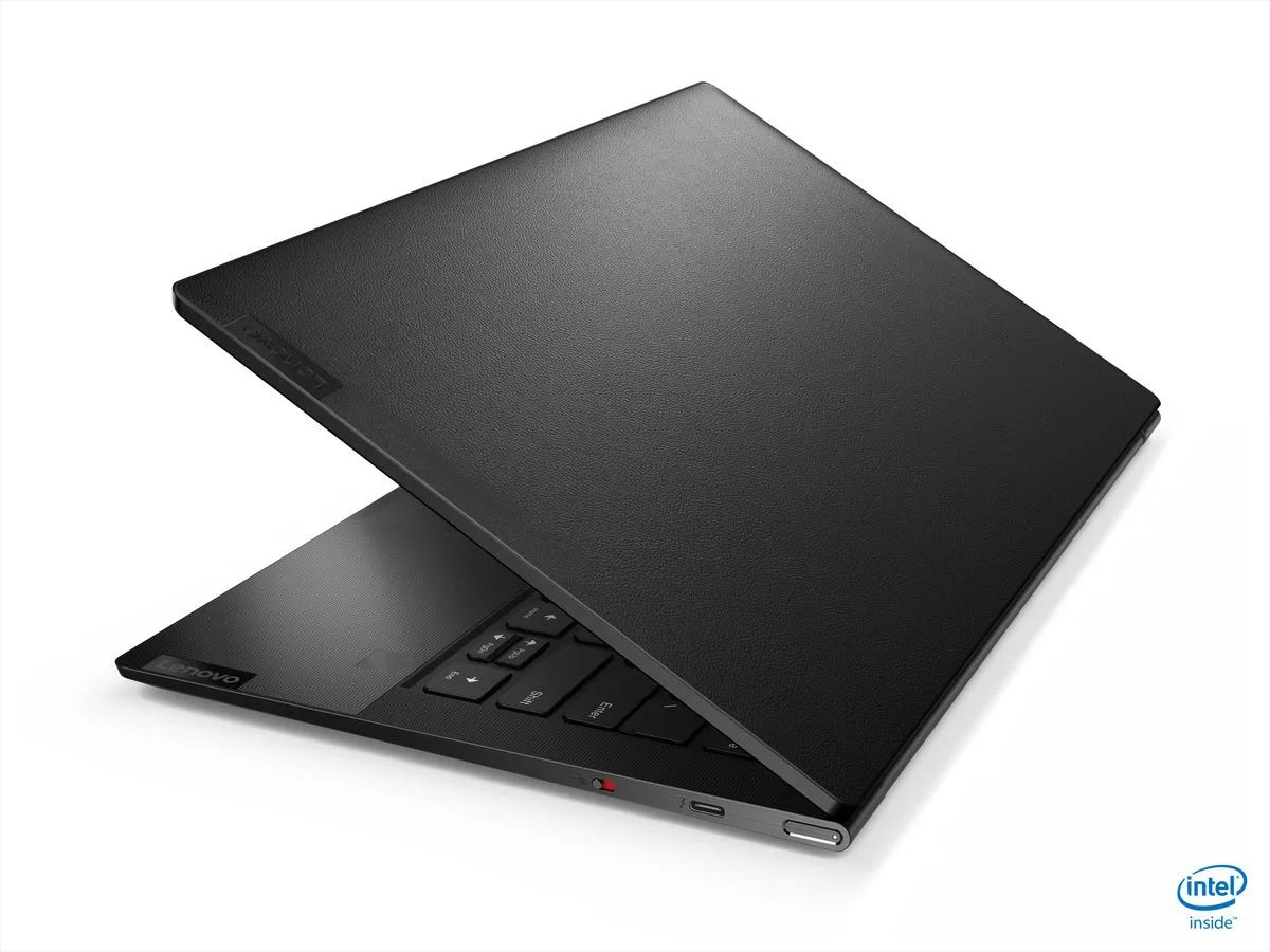The Lenovo Yoga Slim 9i half-open from the right side.
